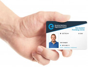 Hand holding EWRB Licence card
